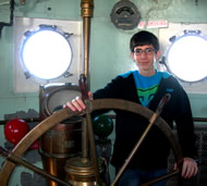 Boy at the wheel of LV-112